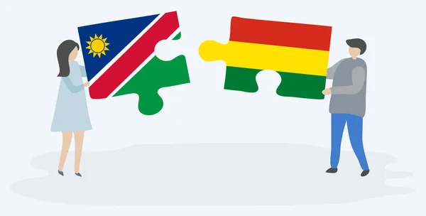 Pareja Sosteniendo Dos Piezas Rompecabezas Con Banderas Namibia Bolivia Namibia — Vector de stock