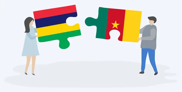 Paar Houden Twee Puzzels Stukken Met Mauritiaanse Kameroense Vlaggen Nationale — Stockvector