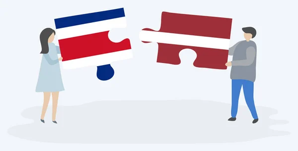 Couple Tenant Deux Pièces Puzzles Avec Des Drapeaux Costaricains Lettons — Image vectorielle