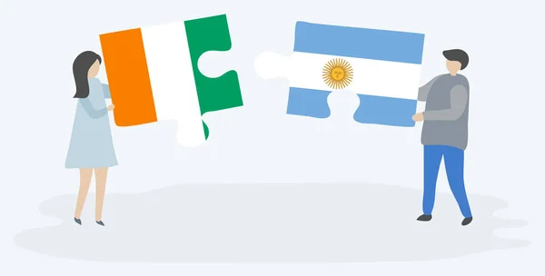 Pár Két Rejtvénydarabot Tartott Elefántcsontparti Argentin Zászlókkal Elefántcsontpart Argentína Nemzeti — Stock Vector