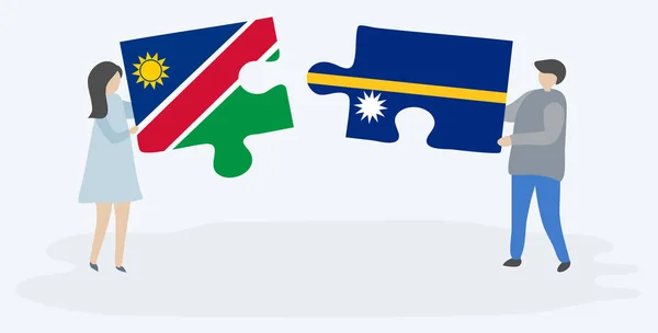 Casal Segurando Duas Peças Quebra Cabeças Com Bandeiras Namibianas Nauruanas — Vetor de Stock