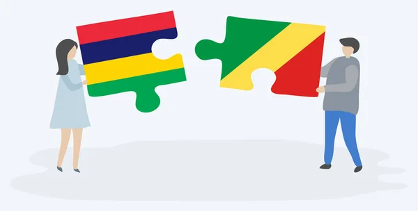 Ζευγάρι Που Κρατά Δύο Κομμάτια Παζλ Σημαίες Μαυρικίου Και Κονγκό — Διανυσματικό Αρχείο