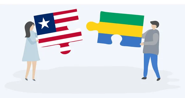 Пара Держащая Две Головоломки Либерийскими Габонскими Флагами Государственные Символы Либерии — стоковый вектор