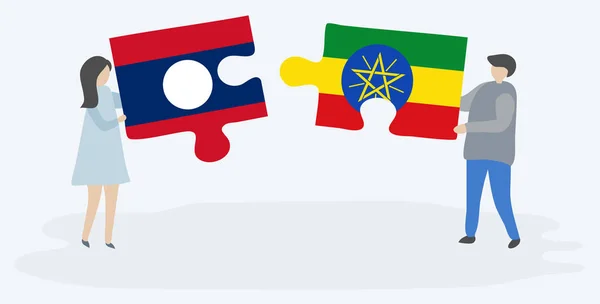 Lao Etiyopya Bayrakları Ile Iki Bulmaca Parçaları Tutan Çift Laos — Stok Vektör