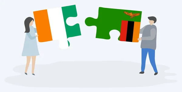 Pár Jich Drží Dvě Skládanky Vlajkami Ivorianu Zambijců Národní Symboly Vektorová Grafika