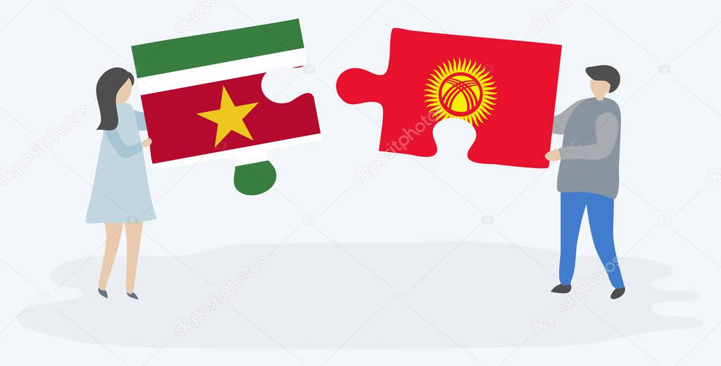 Couple holding two puzzles pieces with Surinamese and Kirgiz flags. Suriname and Kyrgyzstan national symbols together.