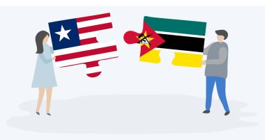 Liberya ve Mozambik bayrakları ile iki bulmaca parçaları tutan çift. Liberya ve Mozambik ulusal sembolleri birlikte.