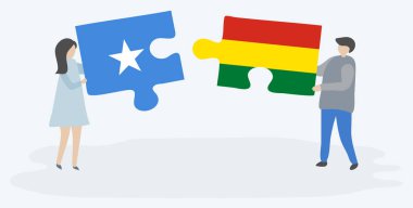 Somali ve Bolivya bayraklarıyla iki bulmaca tutan çift. Somali ve Bolivya ulusal sembolleri birlikte.