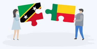 Kittitian ve Beninese bayrakları ile iki bulmaca parçaları tutan çift. Saint Kitts ve Nevis ve Benin ulusal sembolleri birlikte.