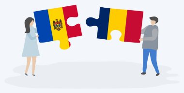 Moldova ve Chadian bayrakları ile iki bulmaca parçaları tutan çift. Moldova ve Çad ulusal sembolleri birlikte.