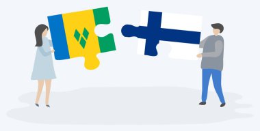 Vincentian ve Fin bayrakları ile iki bulmaca parçaları tutan çift. Saint Vincent ve Grenadinler ve Finlandiya ulusal sembolleri birlikte.