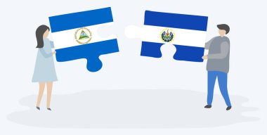 Nikaragua ve Salvador bayrakları ile iki bulmaca parçaları tutan çift. Nikaragua ve El Salvador ulusal sembolleri birlikte.