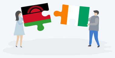 Malavi ve Fildişi bayrakları ile iki bulmaca parçaları tutan çift. Malavi ve Fildişi Sahili ulusal sembolleri birlikte.