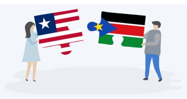 Liberya ve Güney Sudan bayrakları ile iki bulmaca parçaları tutan çift. Liberya ve Güney Sudan ulusal sembolleri birlikte.