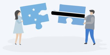 Mikronezya ve Motswana bayrakları ile iki bulmaca parçaları tutan çift. Mikronezya ve Botsvana ulusal sembolleri birlikte.