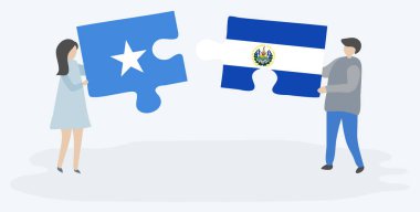 Çift Somali ve Salvador bayrakları ile iki bulmaca parçaları tutan. Somali ve El Salvador ulusal sembolleri birlikte.