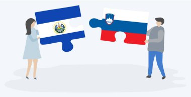 Salvador ve Sloven bayrakları ile iki bulmaca parçaları tutan çift. El Salvador ve Slovenya ulusal sembolleri birlikte.