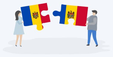 Moldova ve Moldova bayraklarıyla iki bulmaca parçası tutan çift. Moldova ve Moldova ulusal sembolleri birlikte.