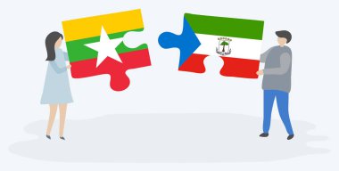 Çift Birmanya ve Ekvator Ginesi bayrakları ile iki bulmaca parçaları tutan. Myanmar ve Ekvator Ginesi ulusal sembolleri birlikte.