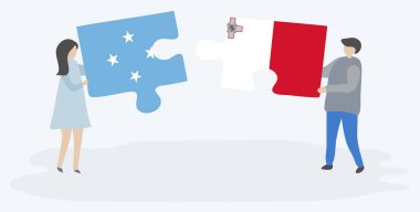 Mikronezya ve Malta bayrakları ile iki bulmaca parçaları tutan çift. Mikronezya ve Malta ulusal sembolleri birlikte.