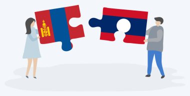 Moğol ve Lao bayrakları ile iki bulmaca parçaları tutan çift. Moğolistan ve Laos ulusal sembolleri birlikte.