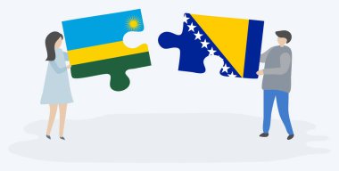 Ruanda ve Bosna bayraklarıile iki bulmaca parçaları tutan çift. Ruanda ve Bosna-Hersek ulusal sembolleri birlikte.