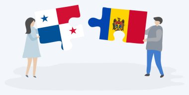 Panama ve Moldova bayraklarıyla iki bulmaca tutan çift. Panama ve Moldova ulusal sembolleri birlikte.