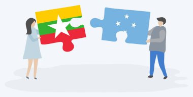 Çift Birmanya ve Mikronezya bayrakları ile iki bulmaca parçaları tutan. Myanmar ve Mikronezya ulusal sembolleri birlikte.