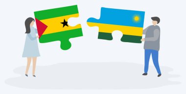 Sao Tomean ve Ruanda bayrakları ile iki bulmaca parçaları tutan çift. Sao Tome ve Principe ve Ruanda ulusal sembolleri birlikte.