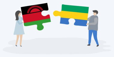 Malavi ve Gabonese bayrakları ile iki bulmaca parçaları tutan çift. Malavi ve Gabon ulusal sembolleri birlikte.