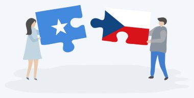 Çift, Somali ve Çek bayraklarıyla iki bulmaca parçası tutuyor. Somali ve Çek Cumhuriyeti ulusal sembolleri birlikte.