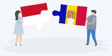 Monegasque ve Andorran bayrakları ile iki bulmaca parçaları tutan çift. Monako ve Andorra ulusal sembolleri birlikte.