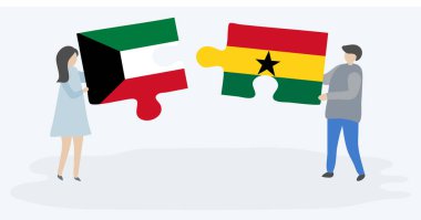 Kuveyt ve Gana bayrakları ile iki bulmaca parçaları tutan çift. Kuveyt ve Gana ulusal sembolleri birlikte.