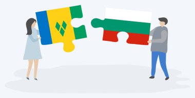 Vincentian ve Bulgar bayrakları ile iki bulmaca parçaları tutan çift. Saint Vincent ve Grenadinler ve Bulgaristan ulusal sembolleri birlikte.