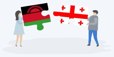 Malavi ve Gürcü bayraklarıyla iki bulmaca tutan çift. Malavi ve Gürcistan ulusal sembolleri birlikte.