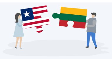 Liberya ve Litvanya bayrakları ile iki bulmaca parçaları tutan çift. Liberya ve Litvanya ulusal sembolleri birlikte.