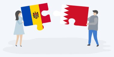 Moldova ve Bahreyn bayrakları ile iki bulmaca parçaları tutan çift. Moldova ve Bahreyn ulusal sembolleri birlikte.