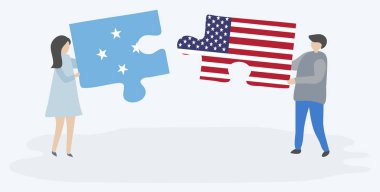 Mikronezya ve Amerikan bayrakları ile iki bulmaca parçaları tutan çift. Mikronezya ve Amerika Birleşik Devletleri ulusal semboller birlikte.