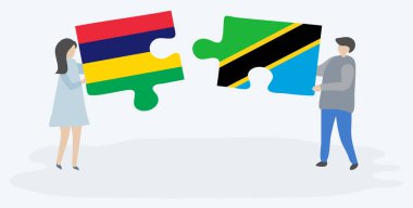 Çift Moritanya ve Tanzanya bayrakları ile iki bulmaca parçaları tutan. Mauritius ve Tanzanya ulusal sembolleri birlikte.