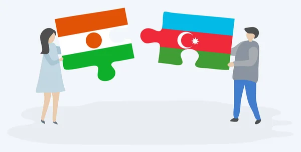 Пара Держащая Две Головоломки Флагом Нигерии Азербайджана Государственные Символы Нигера — стоковый вектор