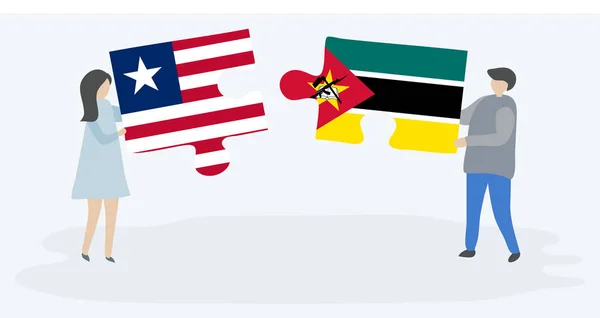 Pareja Sosteniendo Dos Piezas Rompecabezas Con Banderas Liberianas Mozambiqueñas Liberia — Vector de stock
