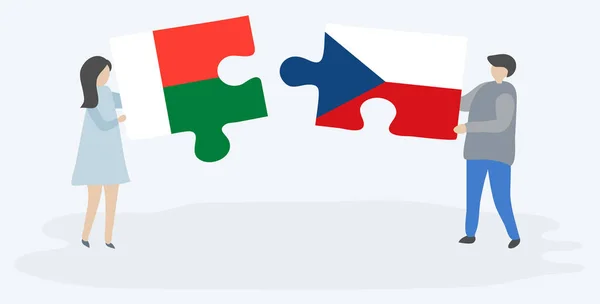 Casal Segurando Duas Peças Quebra Cabeças Com Bandeiras Malgaxe Checa — Vetor de Stock