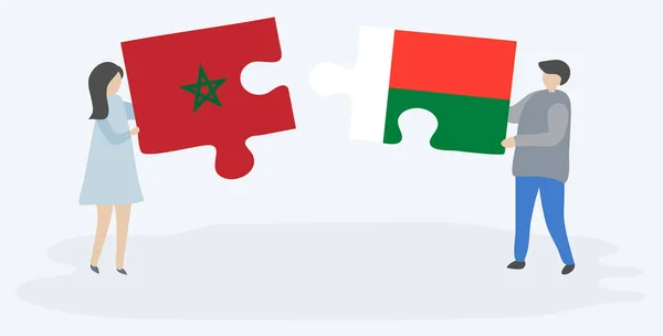 Fas Malagasy Bayrakları Ile Iki Bulmaca Parçaları Tutan Çift Fas — Stok Vektör