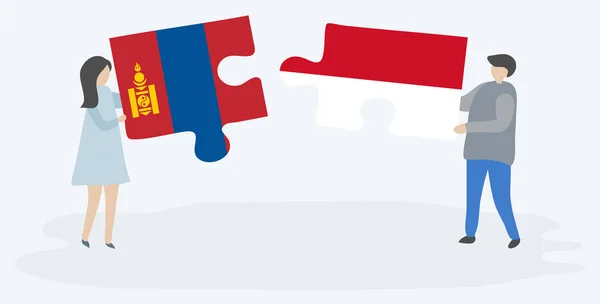 Para Trzyma Dwa Kawałki Puzzli Mongolskimi Indonezyjskimi Flagami Mongolii Indonezji — Wektor stockowy