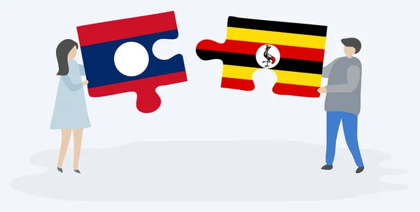 Para Trzyma Dwa Kawałki Puzzli Lao Ugandy Flagi Symbole Narodowe — Wektor stockowy
