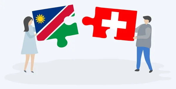 Pareja Sosteniendo Dos Piezas Rompecabezas Con Banderas Namibia Suiza Namibia — Vector de stock
