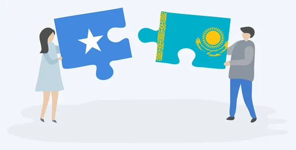 Paar Mit Zwei Puzzleteilen Mit Somalischen Und Kasachischen Flaggen Somalien — Stockvektor