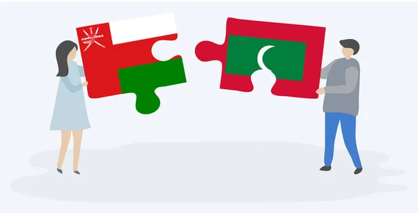 Par Som Innehar Två Pusselbitar Med Omani Och Maldiviska Flaggor — Stock vektor