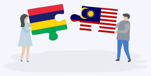 Paar Houden Twee Puzzels Stukken Met Mauritiaanse Maleisische Vlaggen Mauritius — Stockvector