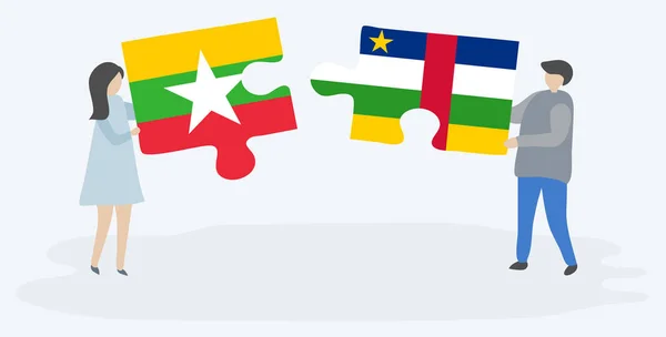 Casal Segurando Duas Peças Quebra Cabeças Com Bandeiras Birmanesas Centro —  Vetores de Stock